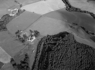 Oblique aerial view centred on the remains of Edzell Castle, looking to the SSE.