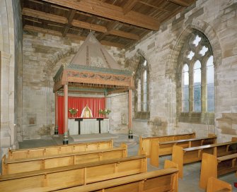 View of 19th century South East aisle from West