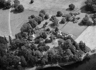 Oblique aerial view centred on Meikleour House and policies, looking to the ENE.