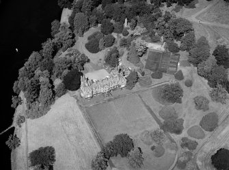 Oblique aerial view centred on Meikleour House and policies, looking to the NNW.