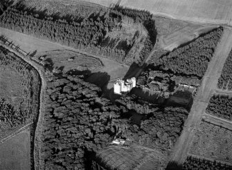 Oblique aerial view centred on Cairnbulg Castle, looking to the ENE.