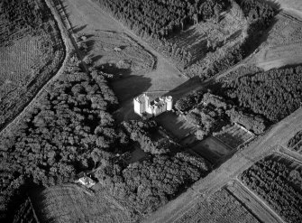 Oblique aerial view centred on Cairnbulg Castle, looking to the NE.
