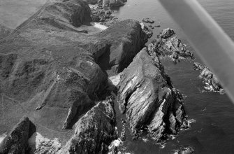 Oblique aerial view of Tronach Castle promontory fort, looking to the WSW.