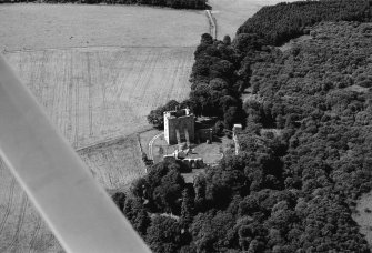 Oblique aerial view centred on the remains of Spynie Palace, looking to the W.