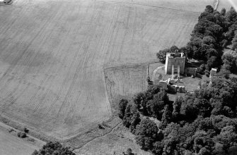 Oblique aerial view centred on the remains of Spynie Palace, looking to the WSW.