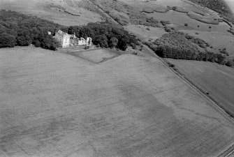 Oblique aerial view centred on the remains of Spynie Palace, looking to the NNE.