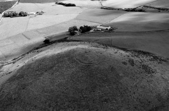 Oblique aerial view centred on the remains of the fort at Wheedlemont, looking to the NE.
