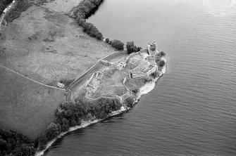 Oblique aerial view centred on Urquhart Castle, looking to the N.