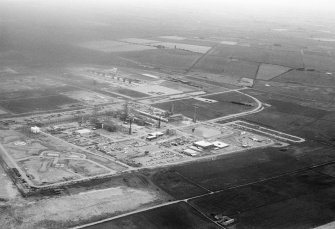 Oblique aerial view centred on the St Fergus Gas Terminal, looking to the WNW.
