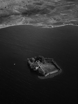 Oblique aerial view centred on the remains of Lochindorb Castle, looking to the ESE.