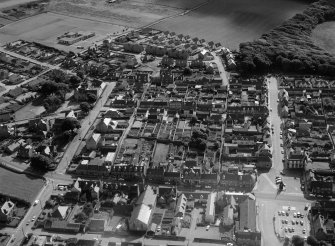 General oblique aerial view centred on the town of Cullen, looking to the SW.