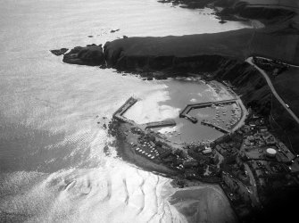 Oblique aerial view centred on Stonehaven harbour, looking to the S.