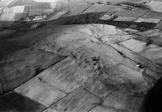 Oblique aerial view centred on the remains of the fort at Durn Hill, looking to the ESE.