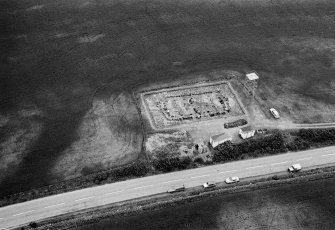 Oblique aerial view centred on the excavation of the timber hall at Balbridie, looking to the N.