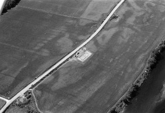 Oblique aerial view centred on the excavation of the timber hall at Balbridie, looking to the SW.