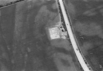 Oblique aerial view centred on the excavation of the timber hall at Balbridie, looking to the ESE.