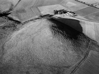 Oblique aerial view centred on the remains of the fort at Wheedlemont, looking to the NE.