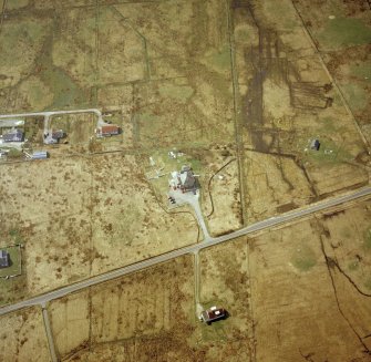 Oblique aerial view centred on the inn, taken from the ENE.