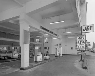 Scanned copy of view of the interior of the garage forecourt in use as a "Jet" filling station seen from Causewayside from the North West.