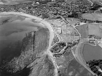 Oblique aerial view with Cowie in the foreground and Stonehaven beyond, looking to the S.