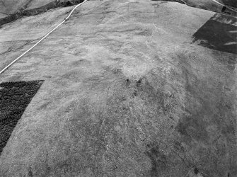 Oblique aerial view of the remains of the fort of Little Conval, looking to the SW.