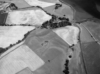 Oblique aerial view of Tarradale House with the cropmarks adjacent, looking to the ESE.