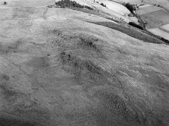 Oblique aerial view of the remains of the fort of Craig Dorney, looking to the E.