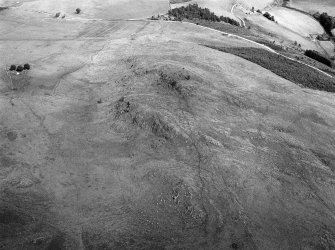 Oblique aerial view of the remains of the fort of Craig Dorney, looking to the ENE.