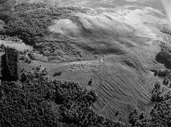 Oblique aerial view centred on the remains of the township and rig at Glen Muick, looking to the ESE.