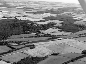 Distant oblique aerial view centred on Balmoral Castle Policies, looking to the SW.