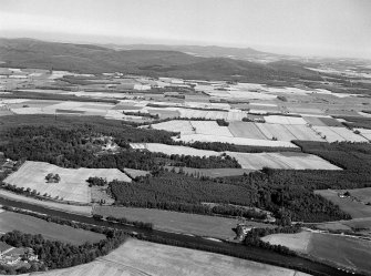 Distant oblique aerial view centred on Balmoral Castle Policies, looking to the SE.