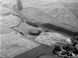 Oblique aerial view centred on the remains of the motte and bailey at Peel of Fichlie, looking to the ESE.