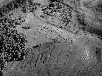 Oblique aerial view centred on the remains of the township and rig at Glen Muick, looking to the NE.