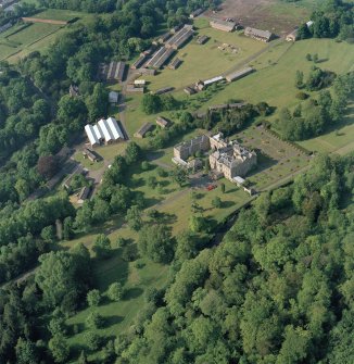 Scanned image of oblique aerial view of Newbattle Abbey, garden, sundials and military camp, taken from the S.