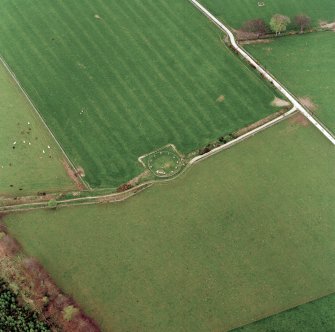Oblique aerial view of the remains of the recumbent stone circle, taken from the S.