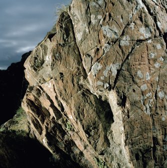 St Ninian's Cave.
Detail of section of W wall of cave showing various incised carvings