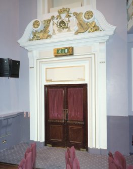Interior. Auditorium, view of door at front of stalls