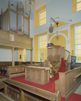 Interior. View from NW showing pulpit and organ