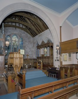 Interior. View of chancel showing pulpit and Forbes-Leith Loft