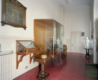 Interior. View of lobby showing display cases and bust