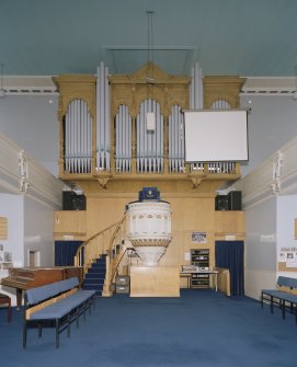 Interior. View from E showing pulpit, communion table and organ