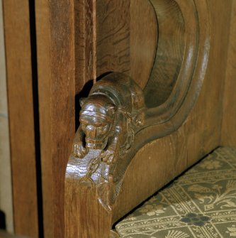Thistle Chapel, interior, detail of carved bear with  muzzle on arm of stall.