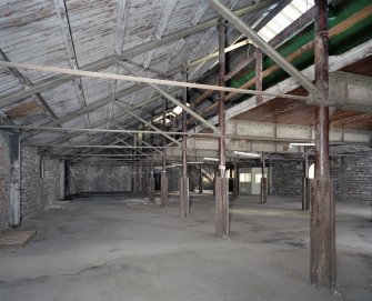 Interior.  4th floor. View of roof and timber mezzanine from NW