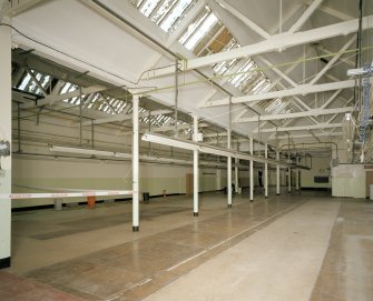 Interior. Ground floor. General view of cutting room from NNE showing the slender column layout and the roof lights