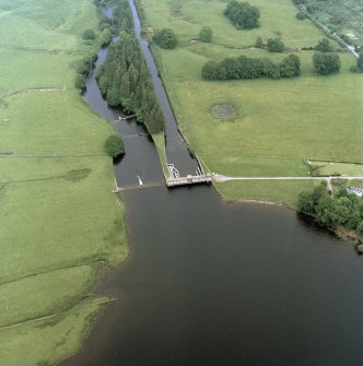 Oblique aerial photograph of Loch Vennechar Sluice House and Reservoir