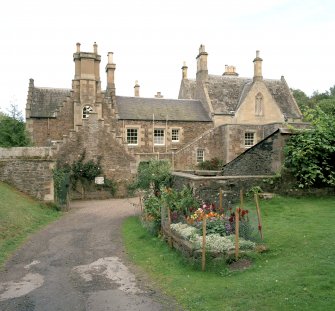 West end of house and chapel, view from South West.