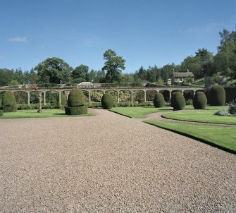 Arched screen between courtyards, view from West.