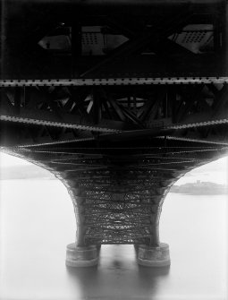 View from the underside of the Forth Bridge looking towards one of the piers with the structure visible in detail.