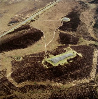 Oblique aerial view centred on the remains of Camster chambered 
cairns, taken from the NW.
