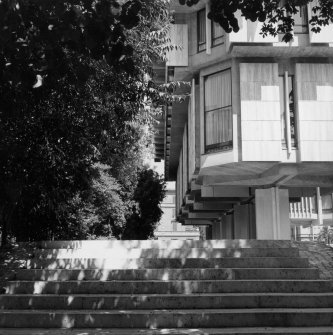View of corner of the chancery building and garden steps.